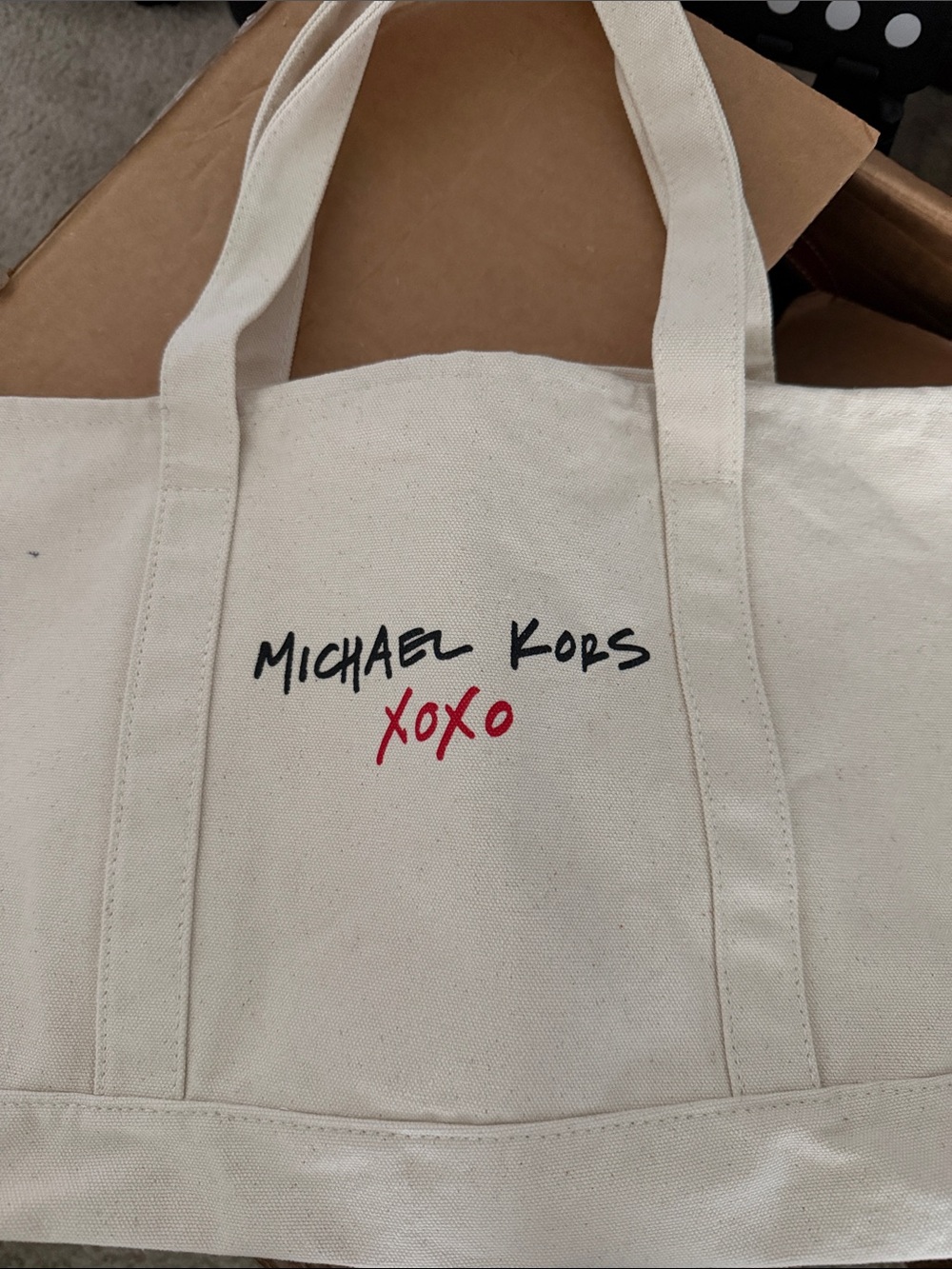 Michael Kors Cream Canvas Tote with Red 'XOXO' Accent